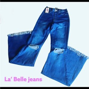Blue jean flare leg fringe cut bell bottom.